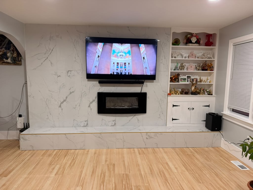 Finished fireplace renovation by B&O Construction